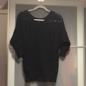 Knitted. Shiny. Sweater